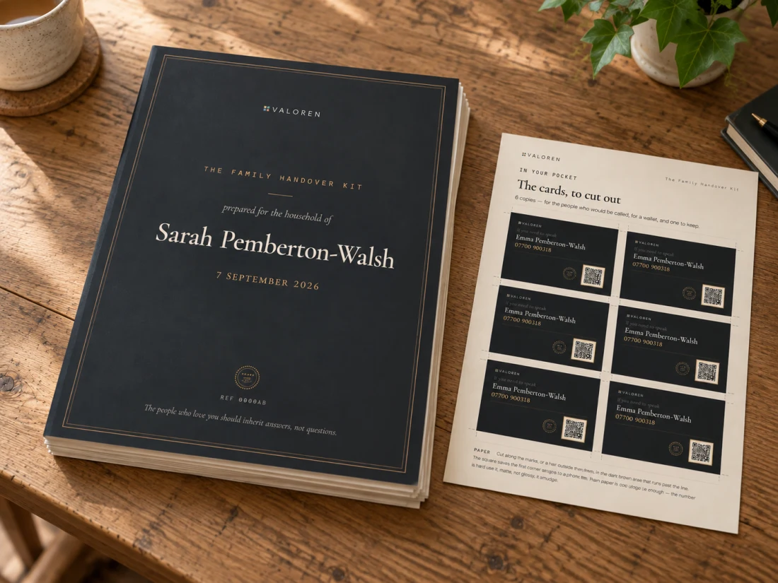 The Family Handover Kit's cover sheet on top of its loose printed pages, beside the cut-out cards.